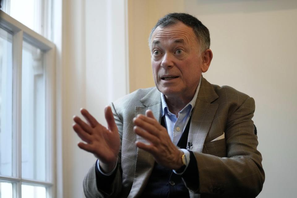 Businessman Ian Maxwell, brother of Ghislaine Maxwell gestures during an interview at his office in London, Monday, Nov. 15, 2021. The brother of a British socialite charged with helping Jeffrey Epstein exploit underage girls says her prosecution is “the most over-hyped trial of the century,” designed to break a woman targeted by authorities desperate to blame someone for the late financier’s crimes. Ghislaine Maxwell continues to have the backing of her family, and a family member will be in court at all times to show their support, Ian Maxwell said in an interview ahead of the trial, which is set to begin Nov. 29 in U.S. District Court in Manhattan. (AP Photo/Kirsty Wigglesworth)