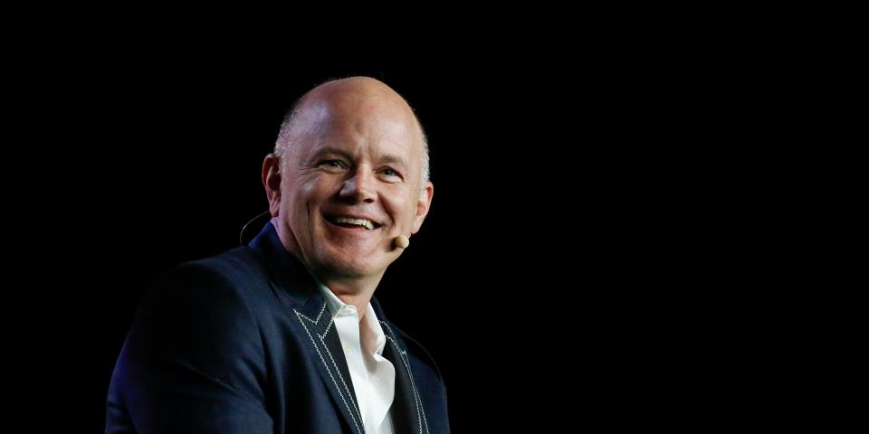 This is a phot of Michael Novogratz speaking in stage with a black background.