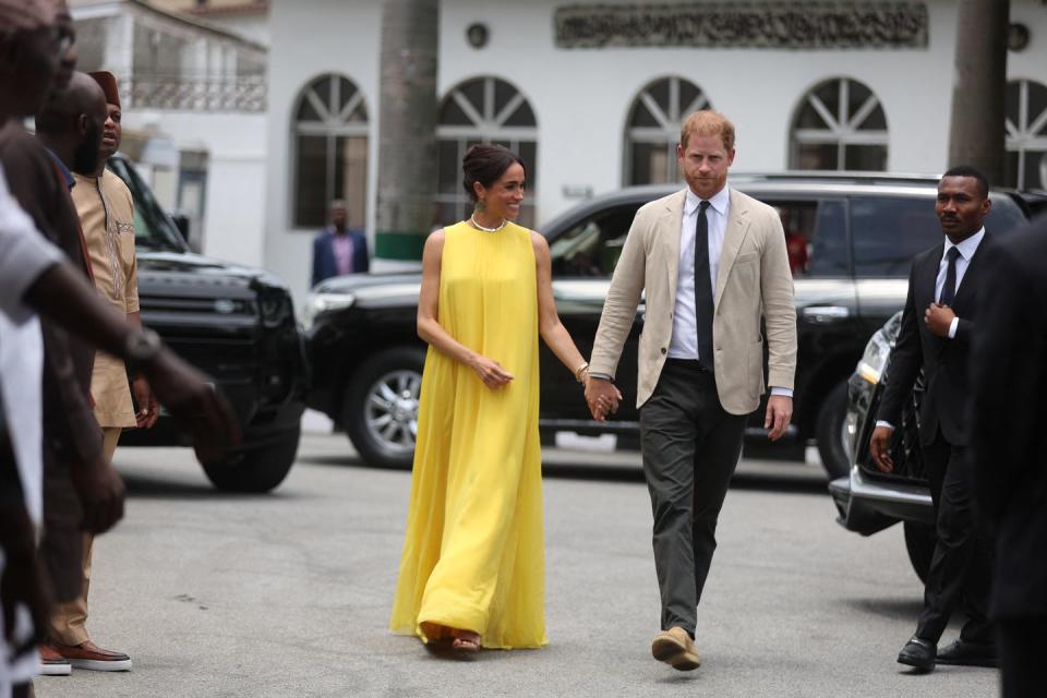 britains meghan l, duchess of sussex, and britains prince harry r, duke of sussex arrive at the state governor house in lagos on may 12, 2024 as they visit nigeria as part of celebrations of invictus games anniversary photo by kola sulaimon afp photo by kola sulaimonafp via getty images