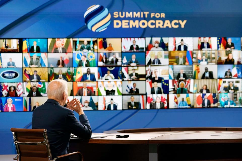 President Joe Biden speaks from the South Court Auditorium on the White House complex in Washington, Thursday, Dec. 9, 2021, for the opening of the Democracy Summit.The two-day virtual summit is billed as an opportunity for leaders and civil society experts from some 110 countries to collaborate on fighting corruption and promoting respect for human rights. (AP Photo/Susan Walsh)