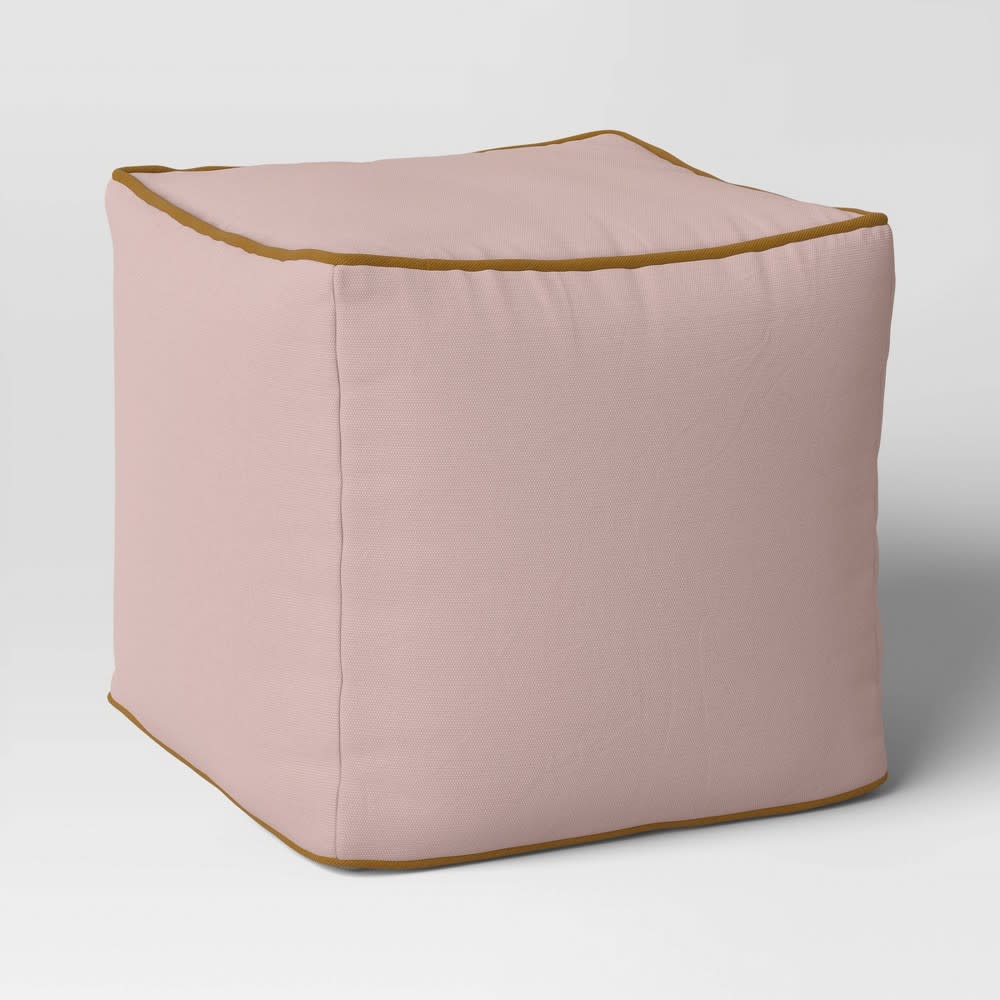 <p><a href="https://go.redirectingat.com?id=74968X1596630&url=https%3A%2F%2Fwww.target.com%2Fp%2Fcolor-block-with-contrast-piping-pouf-pink-metal-byz-bronze-room-essentials-8482%2F-%2FA-87295735&sref=https%3A%2F%2Fwww.cosmopolitan.com%2Flifestyle%2Fg41215180%2Fbest-target-products-under-50%2F" rel="nofollow noopener" target="_blank" data-ylk="slk:Shop Now;elm:context_link;itc:0;sec:content-canvas" class="link rapid-noclick-resp">Shop Now</a></p><p>Pouf Ottoman</p><p>target.com</p><p>$45.00</p><span class="copyright">Room Essentials</span>