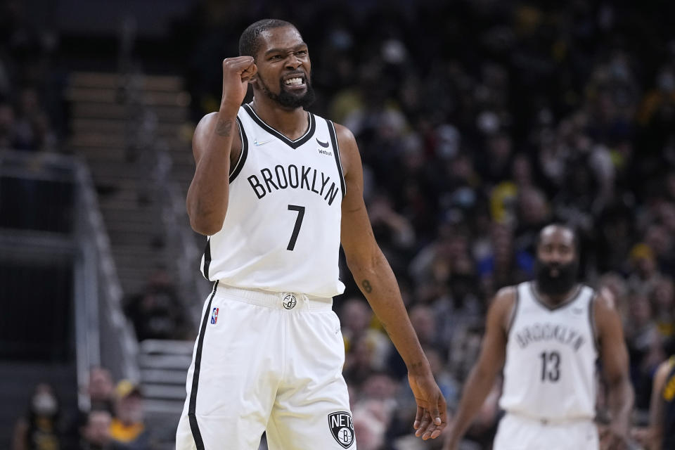 Brooklyn Nets' Kevin Durant reacts during the second half of the team's NBA basketball game against the Indiana Pacers, Wednesday, Jan. 5, 2022, in Indianapolis. (AP Photo/Darron Cummings)