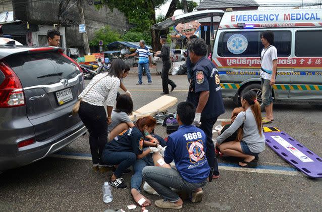 Injured people receive first aid after a bomb exploded in Trang, Thailand. Picture: Reuters