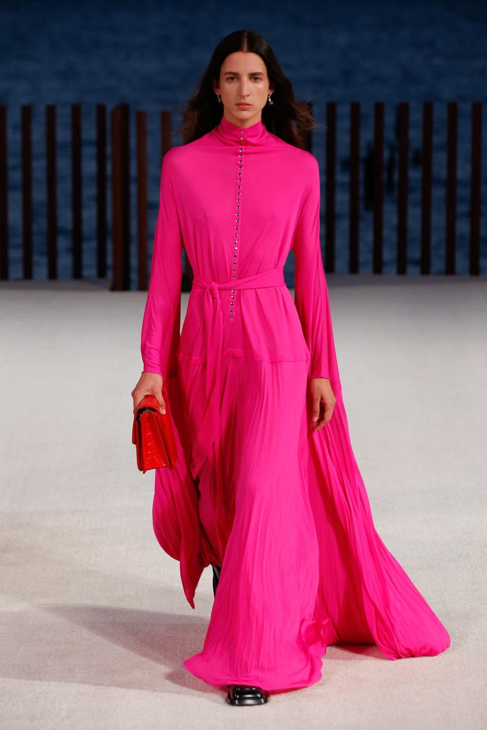<h2>Summer 2022 Trend: Pink</h2><br>While summer will give rise to many bold color trends — see: <a href="https://www.refinery29.com/en-us/2022/03/10914993/orange-color-trend-spring-2022" rel="nofollow noopener" target="_blank" data-ylk="slk:orange" class="link ">orange</a>, <a href="https://www.refinery29.com/en-us/2022/02/10860611/copenhagen-fashion-week-neon-green-trend-fall-2022" rel="nofollow noopener" target="_blank" data-ylk="slk:neon green" class="link ">neon green</a>, and purple — pink will be <em>the</em> color of the year. For proof, see the <a href="https://www.vogue.com/fashion-shows/fall-2022-ready-to-wear/valentino" rel="nofollow noopener" target="_blank" data-ylk="slk:Valentino Fall 2022" class="link ">Valentino Fall 2022</a> show that featured monochrome fuchsia looks, as well as the <a href="https://www.refinery29.com/en-us/grammys-2022-red-carpet-style" rel="nofollow noopener" target="_blank" data-ylk="slk:Grammys 2022 red carpet" class="link ">Grammys 2022 red carpet</a>, where celebrities like Saweetie, Billy Porter, and even Travis Barker wore various shades of the bold hue.<span class="copyright">Photo: Jonas Gustavsson</span>