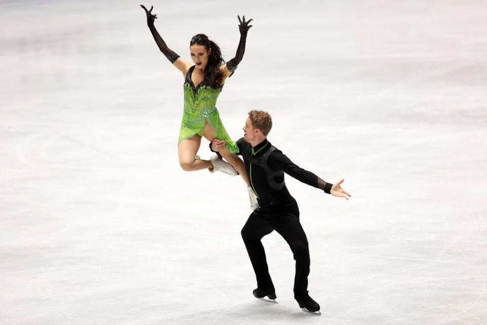 Madison Chock and Evan Bates of Team USA compete in the Ice Dance Rhythm Dance during the ISU Grand Prix of Figure Skating-NHK Trophy at Yoyogi National Gymnasium on Nov. 12, 2021 in Tokyo.<span class="copyright">Atsushi Tomura—International Skating Union via Getty Images</span>