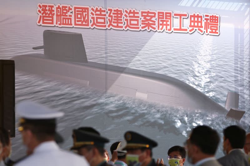 FILE PHOTO: People attend the ceremony for the start of construction of a new submarine fleet in Kaohsiung,