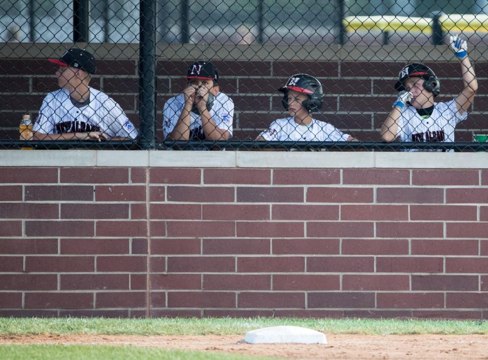 New Albany baseball players, representing Indiana, near the end of their four inning 0-13 loss to Michigan in the regional final, Grand Park, Westfield, Saturday, Aug. 11, 2018. The Grosse Pointe squad will represent the Great Lakes region in the upcoming Little League World Series. 