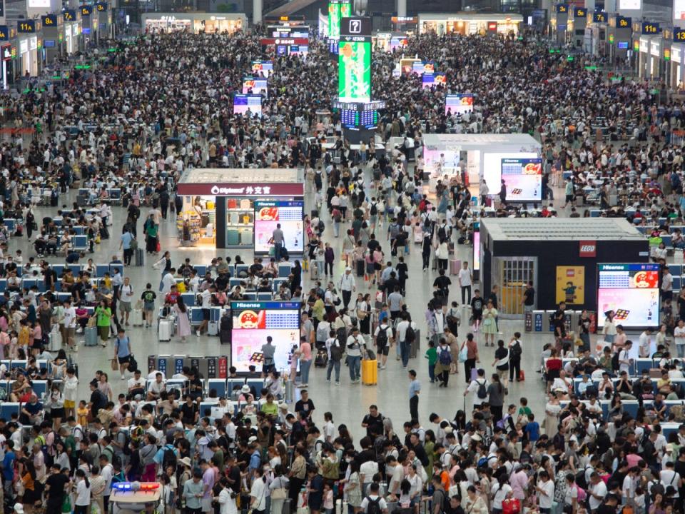 Travelers at the Hongxiao airport in Shanghai, China.