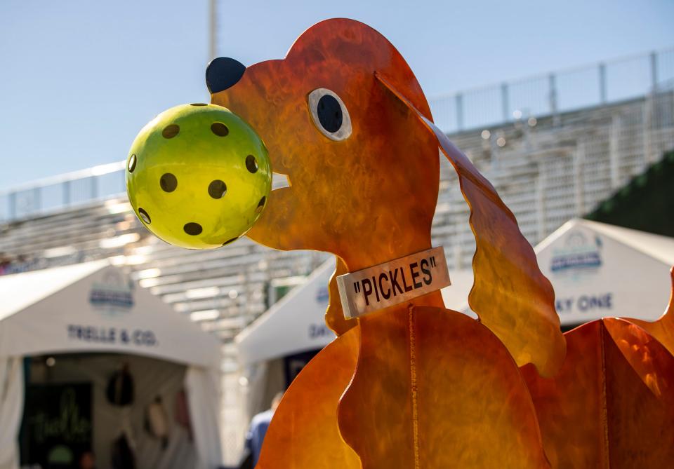 A statue of "Pickles," the dog credited with the namesake of pickleball, is seen during the USA Pickleball National Championships in Indian Wells, Calif., Wednesday, Nov. 9, 2022. 