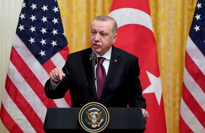 FILE PHOTO: Turkish President Tayyip Erdogan answers questions during a joint news conference with U.S. President Donald Trump at the White House in Washington