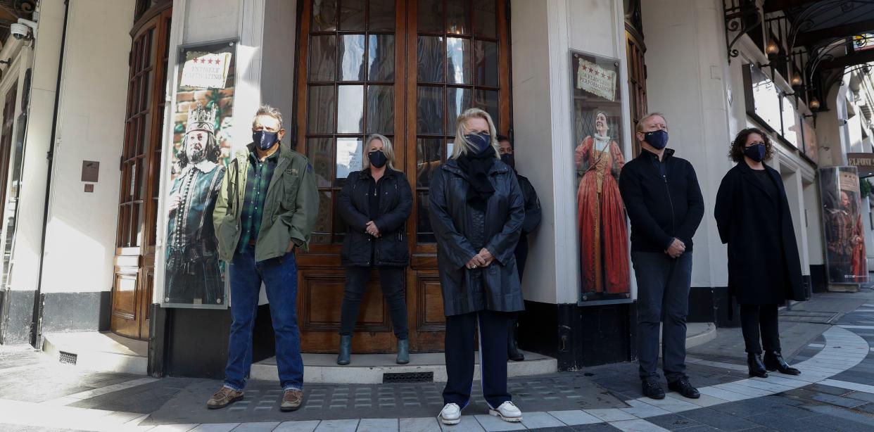 Actress Jennifer Saunders, front center, and five colleagues carry out a "silent stand" outside the Gielgud Theatre in London, England on Monday Oct. 5, 2020, on behalf of the UK theatre industry. The two minute stand is to show solidarity with those in the UK theatre industry who have lost their jobs and received no government support, to highlight the lack of government guidance for the reopening of theatres, and to ask the government to provide the industry with a date when theatres can reopen without social distancing.