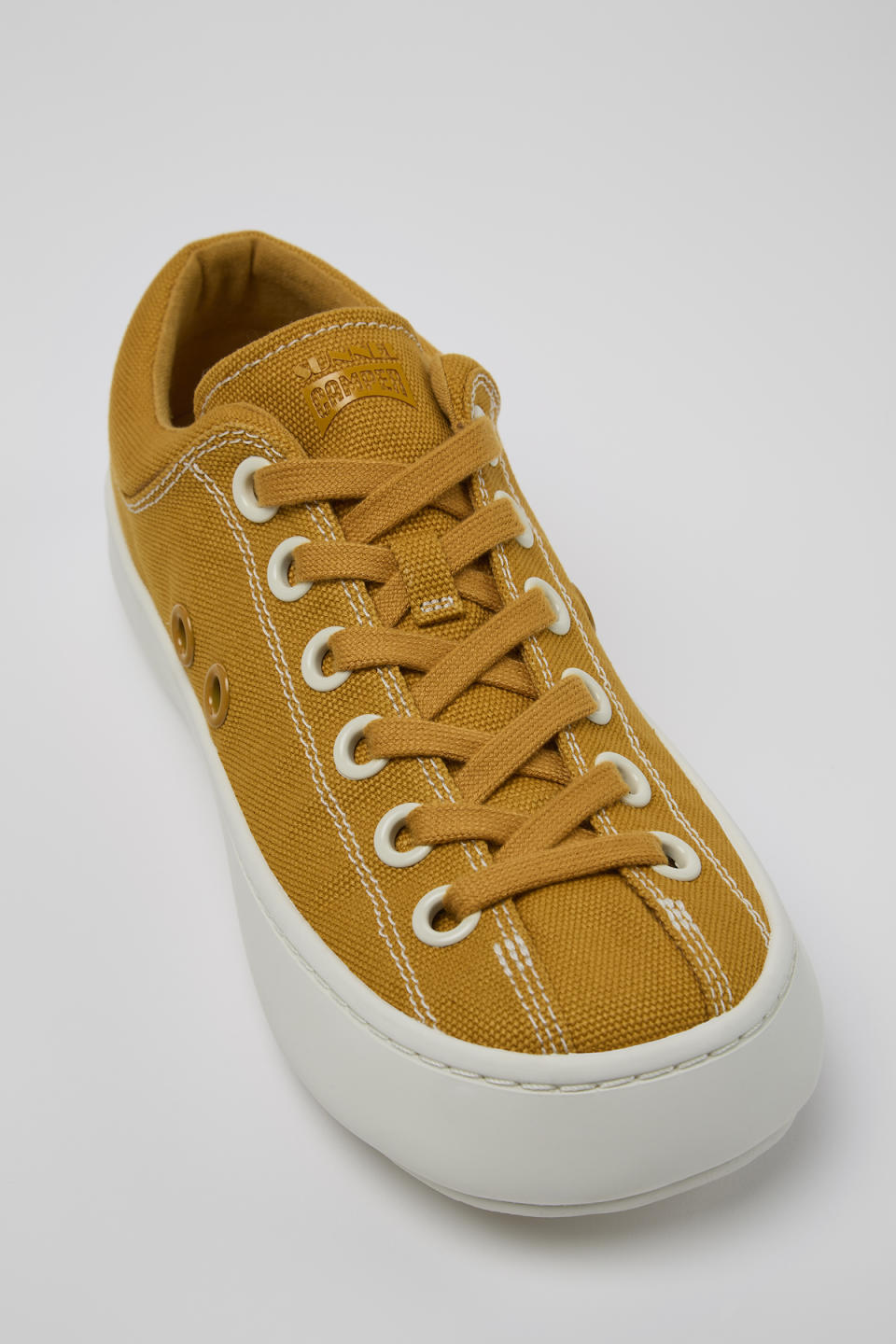 FORONE sneaker in mustard yellow.