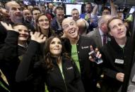 Go Daddy CEO Blake Irving and NASCAR driver Danica Patrick enjoy web hosting company GoDaddy's initial public offering at the New York Stock Exchange April 1, 2015. REUTERS/Brendan McDermid