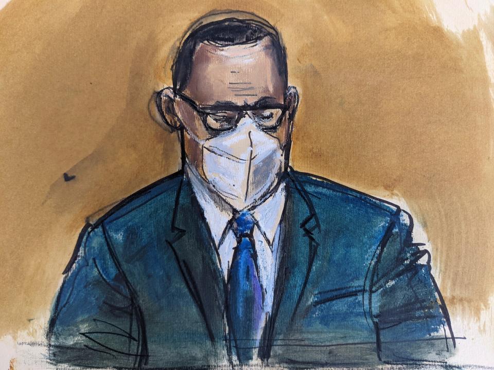 In a courtroom sketch, R. Kelly listens as the jury foreperson reads the verdict on Sept. 27, 2021, in New York.