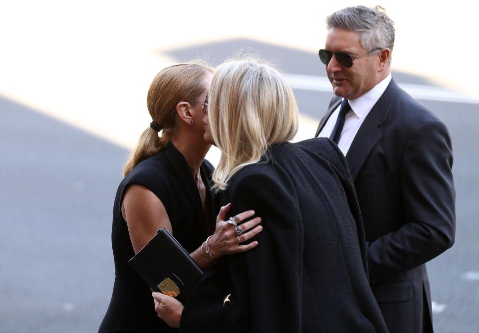 Former Editor in Chief Harper's BAZAAR Australia Kellie Hush, Sam Armytage and her husband Richard Lavender attend the State Funeral for Carla Zampatti at St Mary's Cathedral on April 15, 2021 in Sydney, Australia.