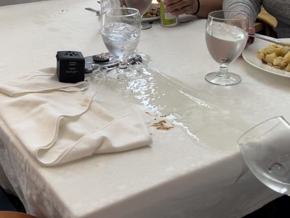 Glasses falling during a giant wave.