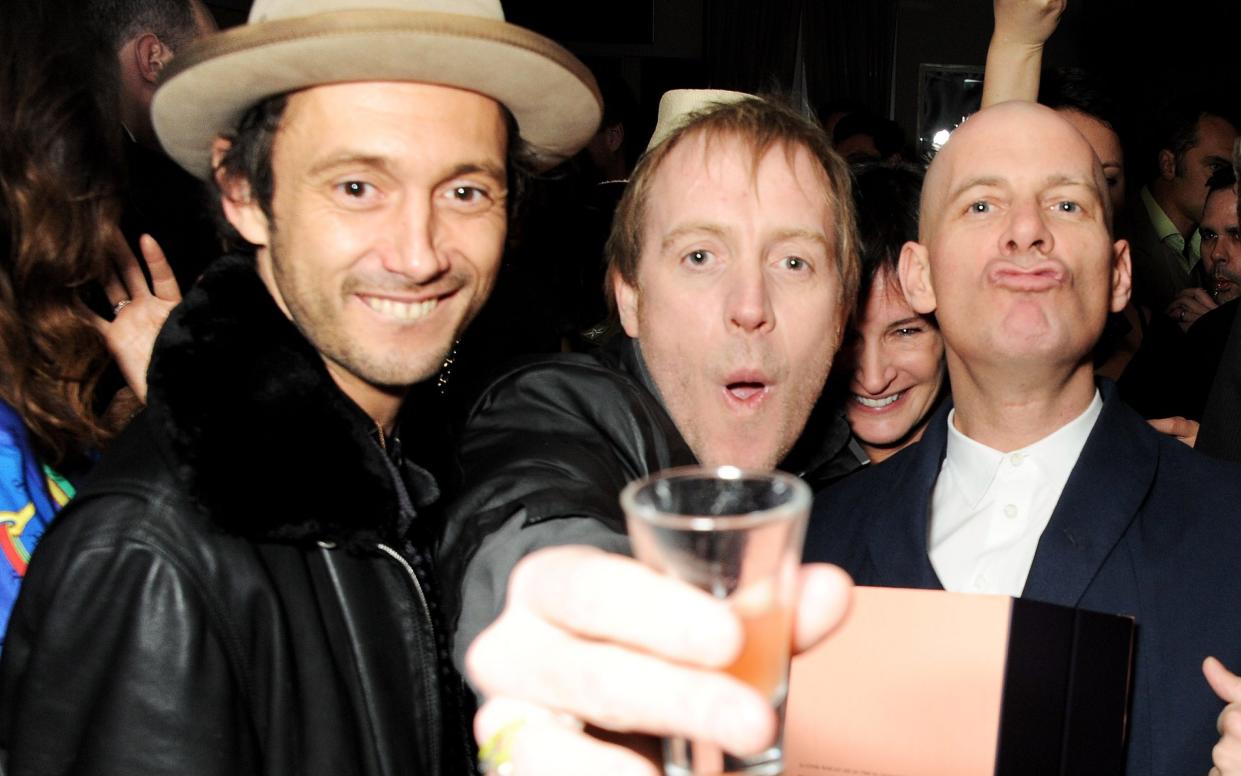 Dan Macmillan, Rhys Ifans and Paul Rowe attend Rowe's 40th birthday party at the Groucho Club in April 2013  - Getty Images Europe