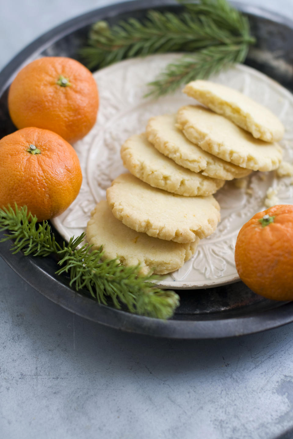 In this image taken on Monday, Nov. 5, 2012, tangerine mace shortbread cookies are shown served on a plate in Concord, N.H. (AP Photo/Matthew Mead)