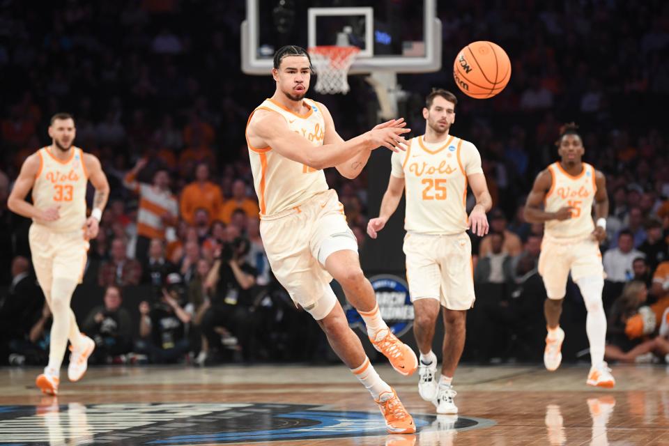 Tennessee forward Olivier Nkamhoua (13) passes the ball during a NCAA Tournament Sweet 16 game between Tennessee and FAU in Madison Square Garden, Thursday, March 23, 2023.