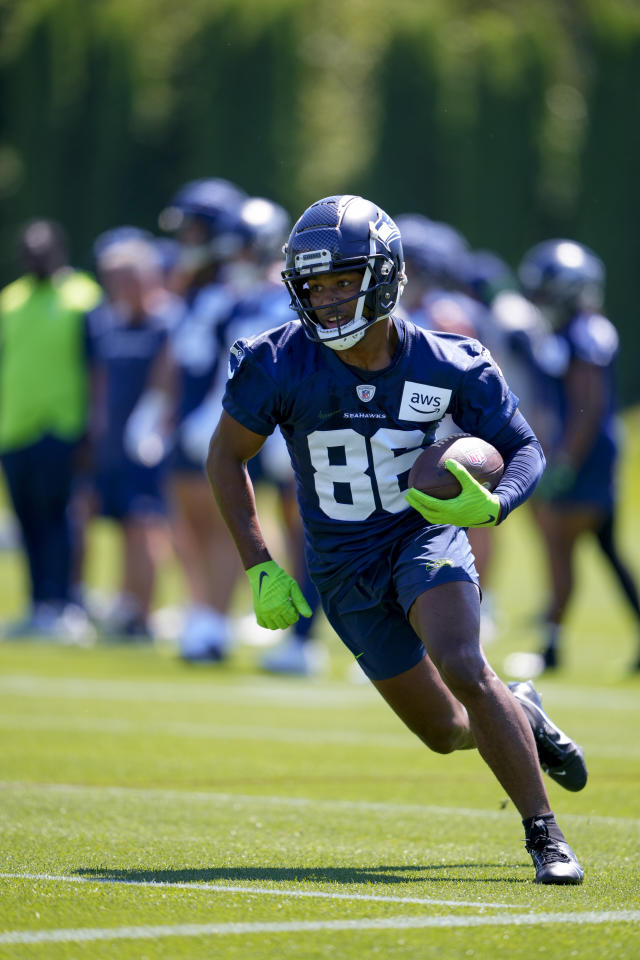 Seahawks WR Easop Winston giving touchdown ball to his mom