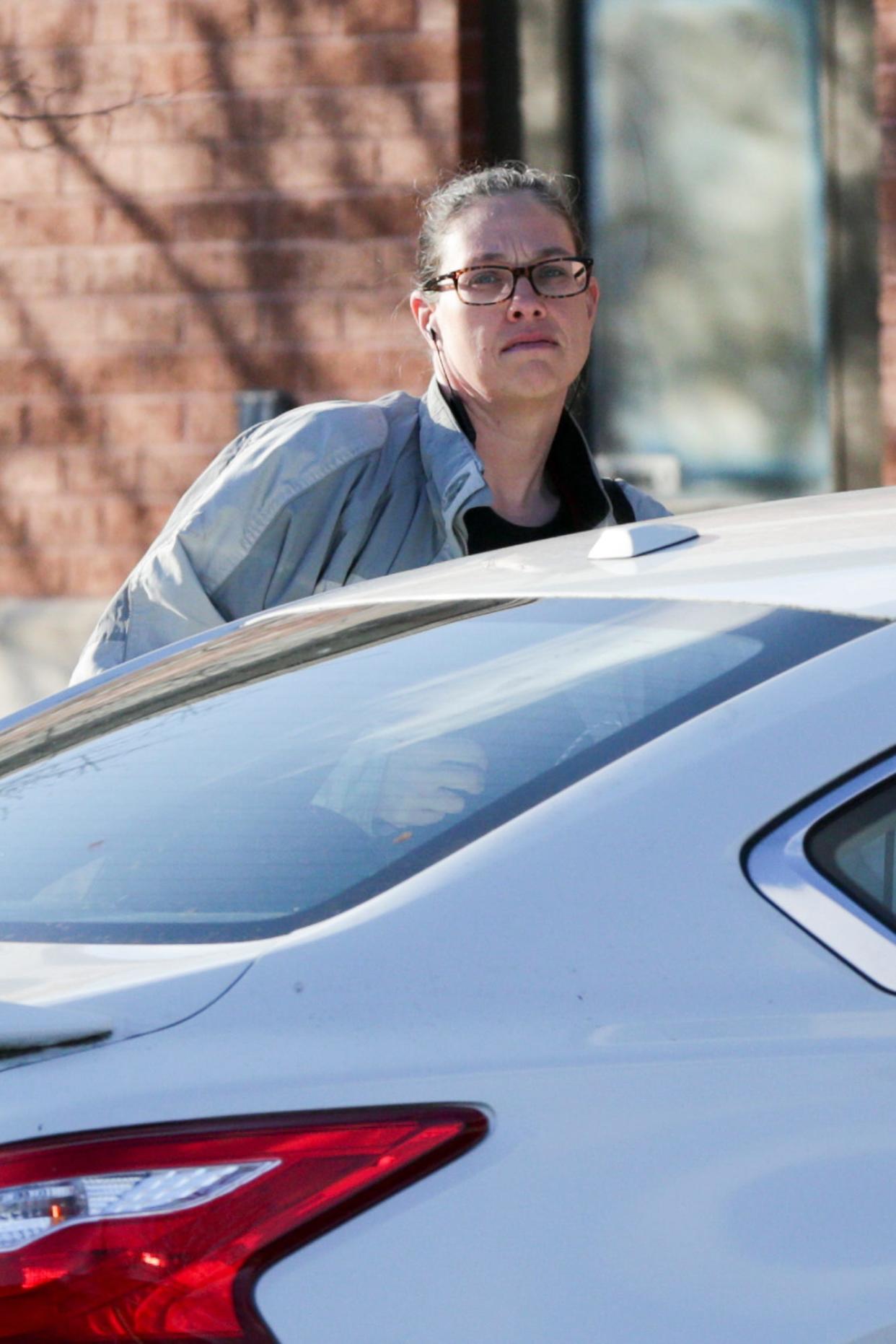 Jennifer Teising walks out of the Wabash Township Trustees Office hours after being found guilty of 21 counts of theft for receiving her salary while not living in the township, Wednesday, Jan. 5, 2022 in West Lafayette. 