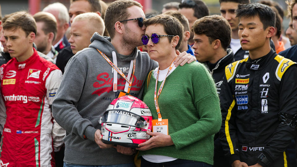 Anthoine Hubert's brother and mother, pictured here during a minute's silence.