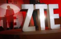 The ZTE company logo is seen as a guest delivers a speech during the company's 15th anniversary celebration in Beijing April 18, 2013. REUTERS/Barry Huang