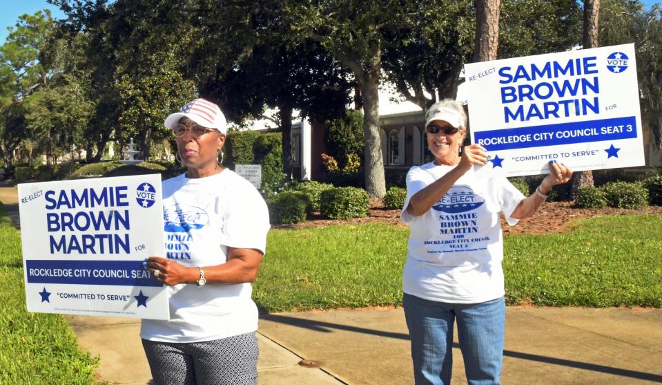 Council member Sammie Brown Martin and supporter Angela Raymond, Mayor Pro-tem of Cape Canaveral, near Rockledge City Hall. Election Day Tuesday in Rockledge.