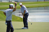 Sepp Straka, of Austria, watches his birdie putt on the 18th hole during the second round of the St. Jude Championship golf tournament Friday, Aug. 12, 2022, in Memphis, Tenn. (AP Photo/Mark Humphrey)