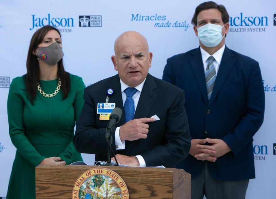 Miami, Florida, January 4, 2021-Carlos Migoya, CEO, Jackson Health System (center) speaks during a press conference outside the Christine E. Lynn Rehabilitation Center at Jackson Memorial Hospital.