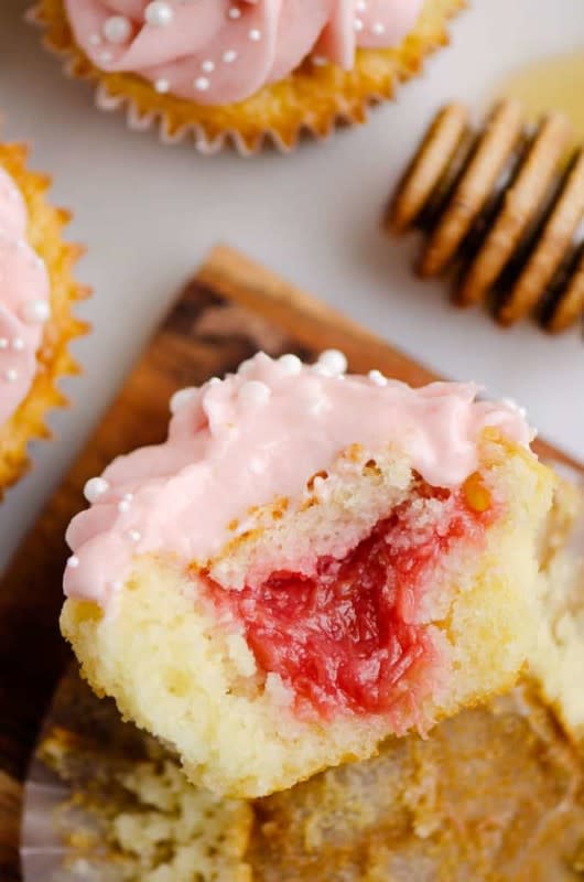 <p>The Creative Bite</p><p>This cupcake is filled with a homemade rhubarb honey sauce and topped with rich buttercream.</p><p><strong>Get the recipe: <a href="https://www.thecreativebite.com/rhubarb-honey-cupcakes/" rel="nofollow noopener" target="_blank" data-ylk="slk:Rhubarb Honey Cupcakes;elm:context_link;itc:0;sec:content-canvas" class="link ">Rhubarb Honey Cupcakes</a></strong></p><p><strong>Related: <a href="https://parade.com/848114/lorilange/15-summer-cupcake-recipes/" rel="nofollow noopener" target="_blank" data-ylk="slk:15 Best Summer-Themed Cupcake Recipes;elm:context_link;itc:0;sec:content-canvas" class="link ">15 Best Summer-Themed Cupcake Recipes</a></strong></p>