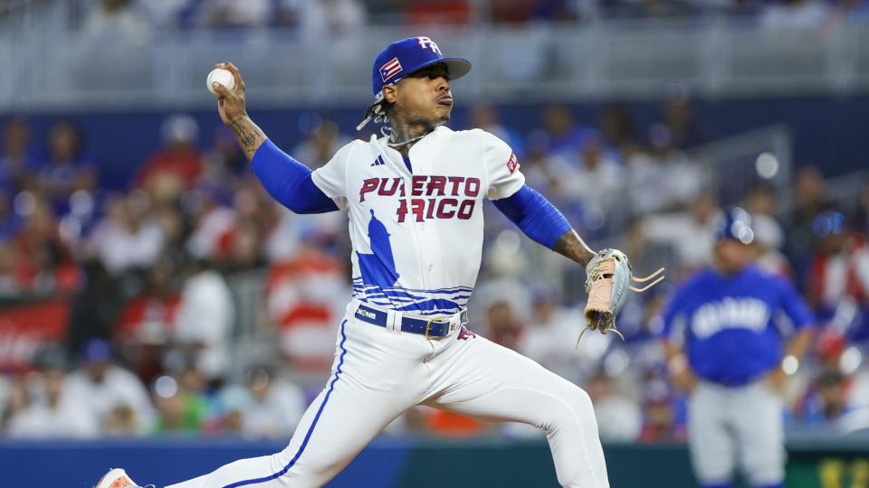Puerto Rico starting pitcher Marcus Stroman (0) delivers a pitch during the second inning against Nicaragua at LoanDepot Park.