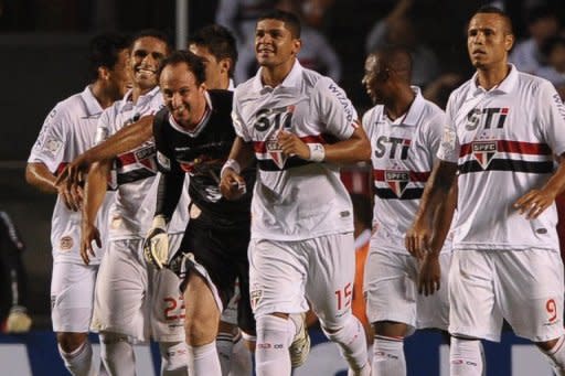 El gigante brasileño Sao Paulo buscará el miércoles en La Paz su pase a la segunda fase de la Copa Libertadores de América 2013 ante el boliviano Bolívar, que se aferra al milagro de remontar una goleada de 5-0 en el partido de ida en el Morumbí. (AFP | Yasuyoshi Chiba)