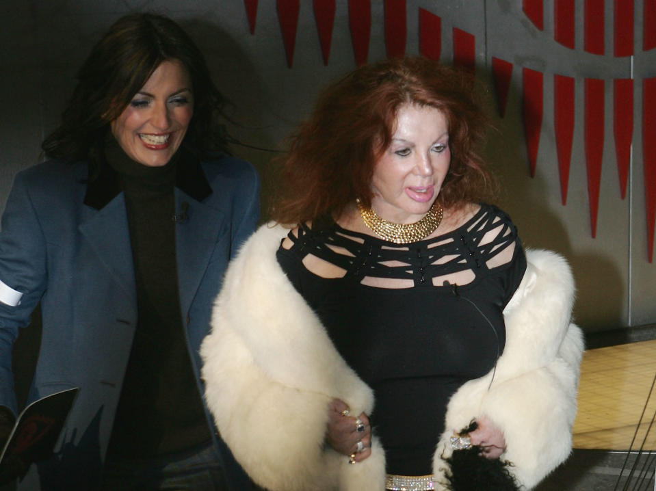 HERTFORDSHIRE, ENGLAND -  JANUARY 14: Celebrity Big Brother III housemate Jackie Stallone and presenter Davina MaCall pose for photographs outside the Big Brother house after Jackie was the first celebrity to be evicted from the house, at Elstree Studios on January 14, 2004 in Hertfordshire, England. (Photo by Gareth Cattermole/Getty Images) 