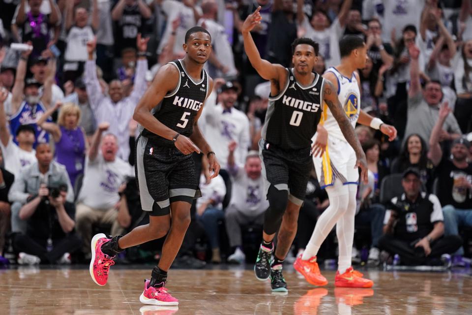 Guard Malik Monk (0) and guard De'Aaron Fox (5) propelled the Sacramento Kings over the Golden State Warriors in Game 1 of their playoff series.