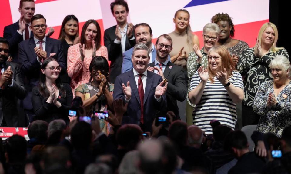 Keir Starmer takes the applause after his speech yesterday.