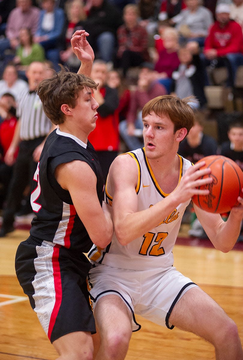 Colonel Crawford's Jacob Maddy looks to make a move to the basket.