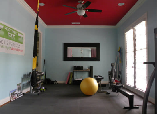 <body> <p> Why sign up at a gym when you can roll out of bed and work out instead? Homeowner Mallory Dubuclet converted an underutilized dining room into an <a rel="nofollow noopener" href=" http://www.bobvila.com/articles/diy-gym/#.VVoHPo5Viko?bv=yahoo" target="_blank" data-ylk="slk:fitness room;elm:context_link;itc:0;sec:content-canvas" class="link ">fitness room</a> by laying foam mat over the flooring, attaching TRX straps, and bringing in free weights and other workout equipment. Now the at-home setup offers the perfect excuse to enjoy the room's view more than ever. </p> <p><strong>Related: <a rel="nofollow noopener" href=" http://www.bobvila.com/articles/279-design-a-home-gym/#.VVoHPo5Viko?bv=yahoo" target="_blank" data-ylk="slk:Design a Home Gym;elm:context_link;itc:0;sec:content-canvas" class="link ">Design a Home Gym</a> </strong> </p> </body>