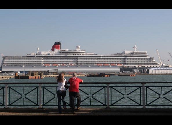 OCTOBER 08:  People look at Cunard's newest liner, the Queen Elizabeth, as she is moored on October 8, 2010 in Southampton, England.     <em>Photo by Matt Cardy/Getty Images</em>