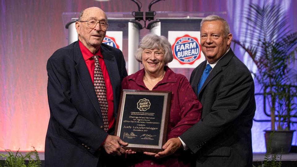 Family members were on hand during the Ohio Farm Bureau annual meeting to accept the award honoring Judy Loudenslager.
