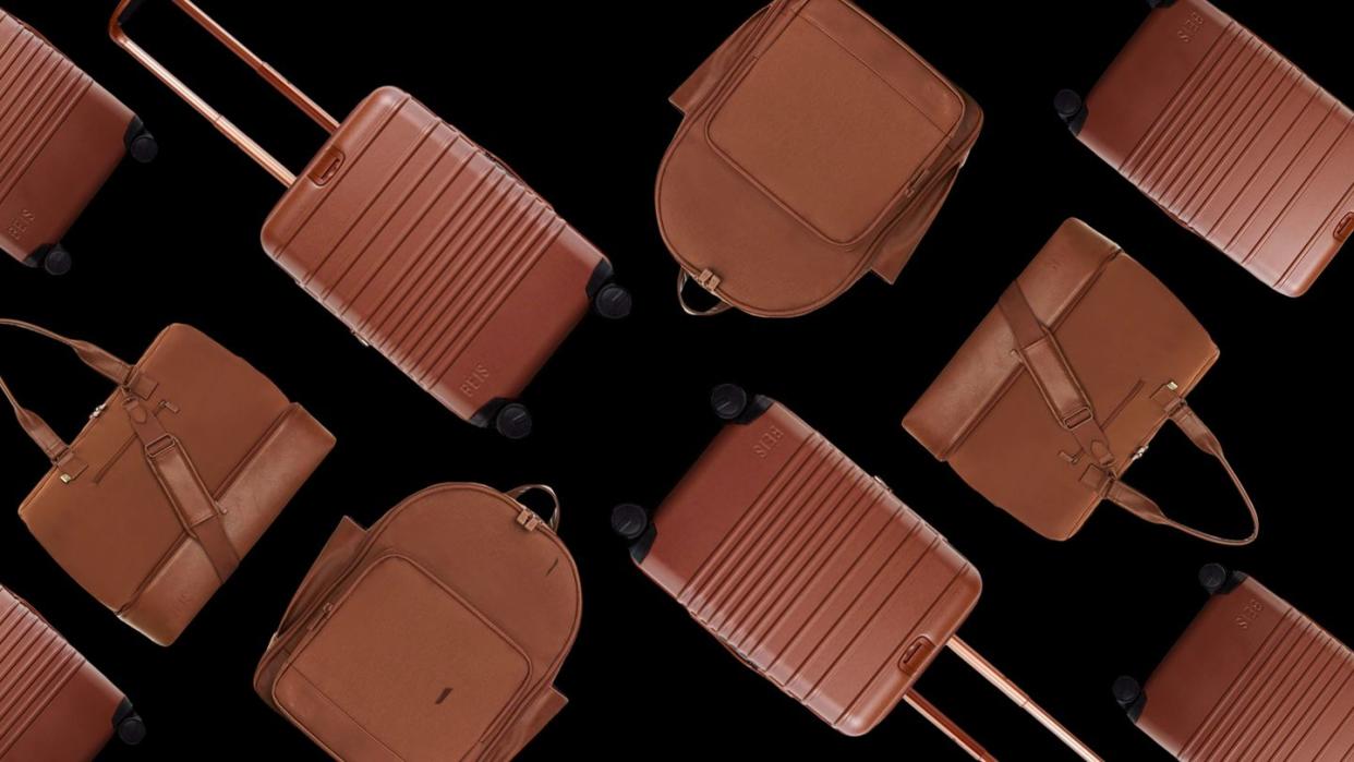 a group of brown leather bags