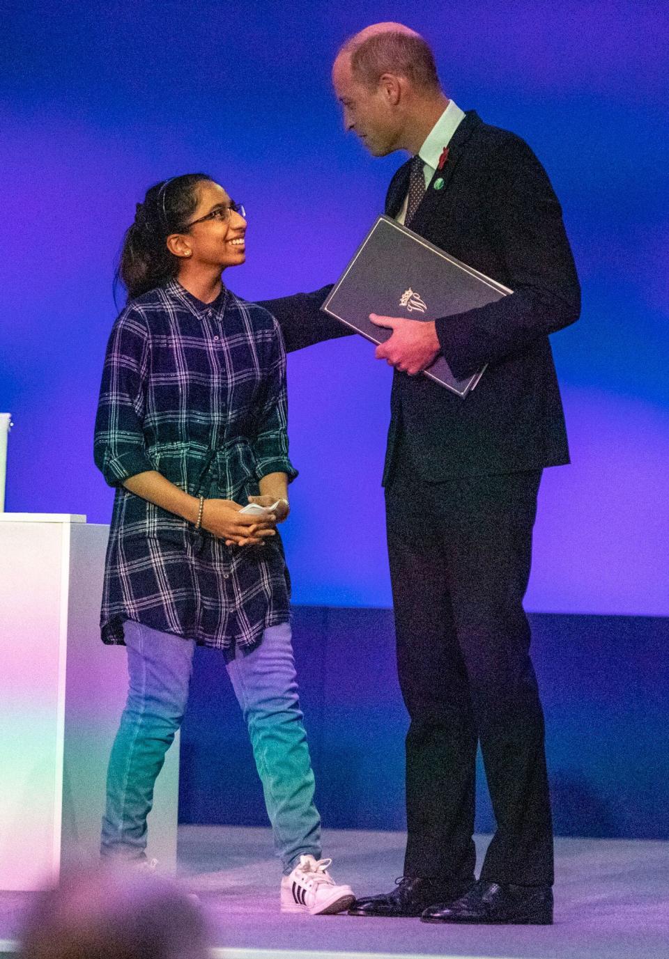 Earthshot Prize finalist Vinisha Umashankar and Prince William, Duke of Cambridge onstage during the World Leaders' Summit "Accelerating Clean Technology Innovation and Deployment" session on day three of COP26 at SECC on November 2, 2021 in Glasgow, United Kingdom. COP26 is the 2021 climate summit in Glasgow. It is the 26th "Conference of the Parties" and represents a gathering of all the countries signed on to the U.N. Framework Convention on Climate Change and the Paris Climate Agreement. The aim of this year's conference is to commit countries to net zero carbon emissions by 2050.