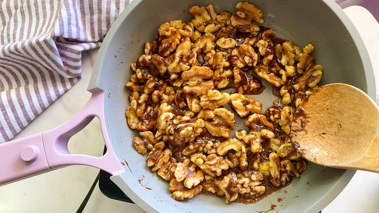 Candied walnuts in pan 