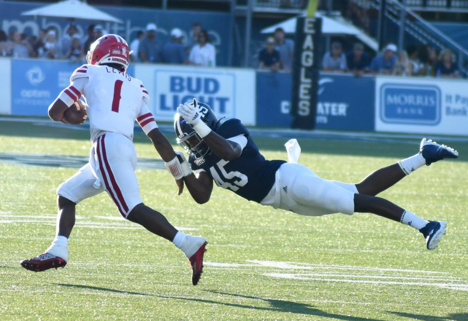 Louisiana quarterback Levi Lewis eludeds the tackle of Georgia Southern linebacker Michael Edwards III on Sept. 25 at Paulson Stadium.