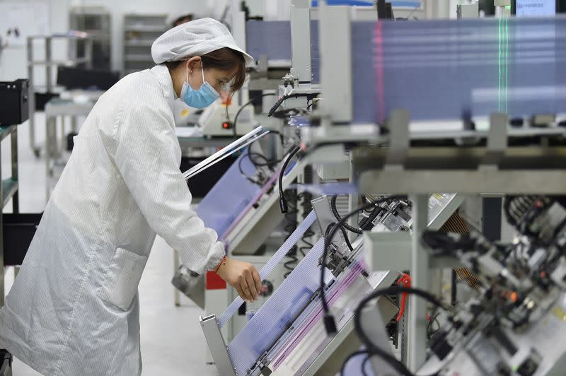 FILE PHOTO: Production line of a semiconductor chip company in Suqian