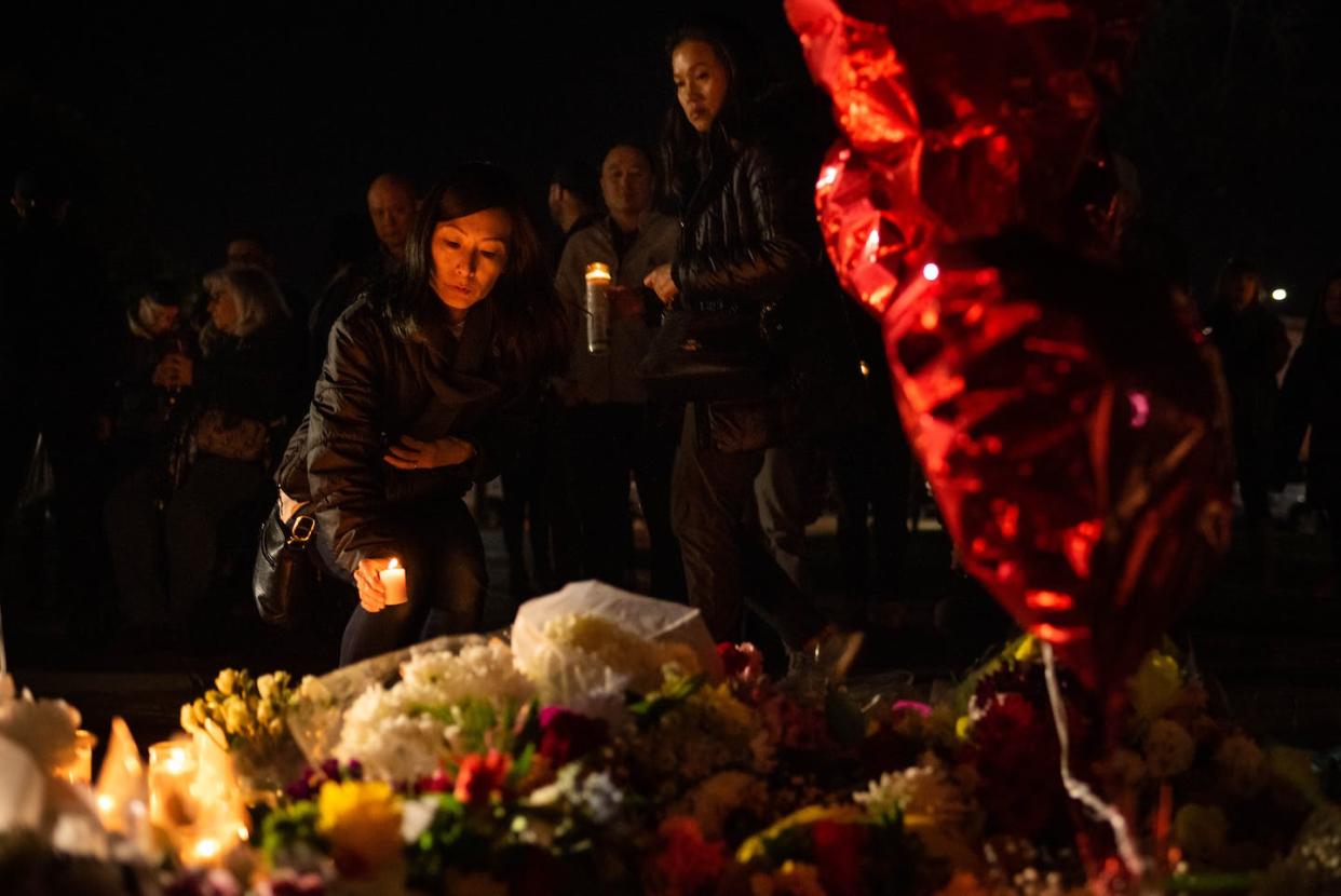 A community in mourning. <a href="https://www.gettyimages.com/detail/news-photo/mourner-attends-a-candlelight-vigil-for-victims-of-a-mass-news-photo/1459049683?phrase=Monterey%20Park&adppopup=true" rel="nofollow noopener" target="_blank" data-ylk="slk:Qian Weizhong/VCG via Getty Images;elm:context_link;itc:0;sec:content-canvas" class="link ">Qian Weizhong/VCG via Getty Images</a>