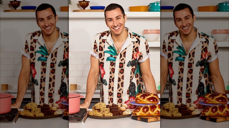 Jake Cohen smiling with baked goods