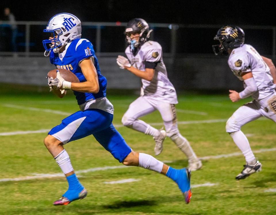 Luke Crivello, 3, of Ripon Christian works his way to the end zone for a touchdown against Golden Sierra Friday Nov. 03, 2023 at Ripon Christian.