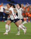 <p>YOKOHAMA, JAPAN - JULY 30: Rose Lavelle #16 of Team United States celebrates following their team's victory in the penalty shoot out during the Women's Quarter Final match between Netherlands and United States on day seven of the Tokyo 2020 Olympic Games at International Stadium Yokohama on July 30, 2021 in Yokohama, Kanagawa, Japan. (Photo by Francois Nel/Getty Images)</p> 