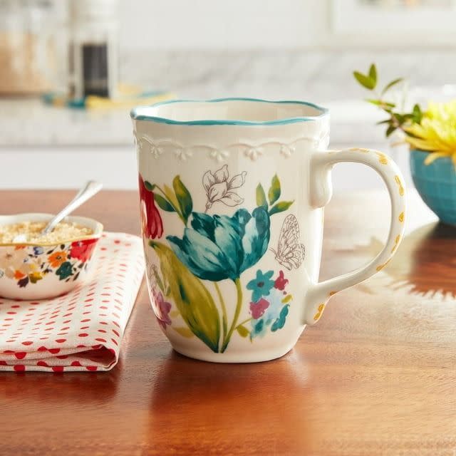 <p><a href="https://go.redirectingat.com?id=74968X1596630&url=https%3A%2F%2Fwww.walmart.com%2Fip%2FThe-Pioneer-Woman-Blooming-Bouquet-Multi-Color-Ceramic-18-Ounce-Mug%2F317202843&sref=https%3A%2F%2Fwww.thepioneerwoman.com%2Fproducts%2Fa60503383%2Free-drummond-mothers-day-gift-guide-walmart-2024%2F" rel="nofollow noopener" target="_blank" data-ylk="slk:Shop Now;elm:context_link;itc:0;sec:content-canvas" class="link rapid-noclick-resp">Shop Now</a></p><p>The Pioneer Woman Blooming Bouquet Ceramic Mug</p><p>walmart.com</p><p>$4.87</p>